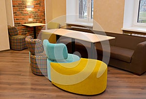 Upholstered modular furniture in office room