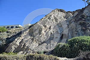 Uplifted geological sedimentery layers in a bluff on Salt Creek Beach in Dana Point, California.