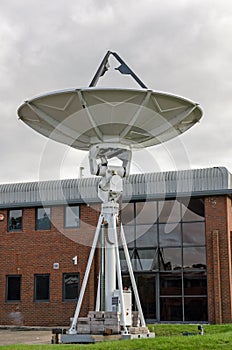 Uplink satellite dish outside offices in Basingstoke, Hampshire
