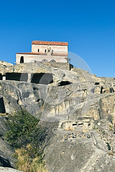 The Uplistsikhe cave complex near Gori, Georgia. Three-nave basilica on the rock. Ancient rock-hewn town in eastern