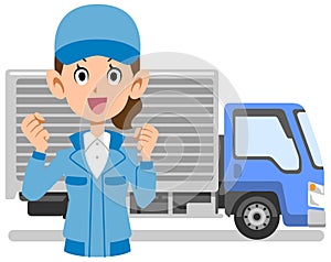 Upper body of woman in work clothes doing guts pose in front of truck