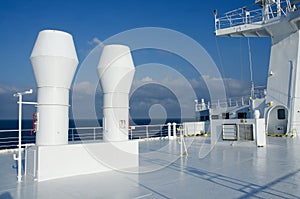 Upper deck of passenger ferryboat with ventilation pipes photo