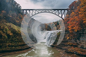 Upper Falls and the Portage Viaduct with autumn color, at Letchworth State Park, New York