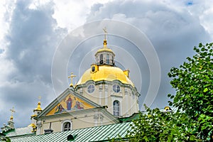 The upper part of gorgeous Baroque Orthodox Holy Dormition Cathedral in Pochayiv Lavra in Ukraine