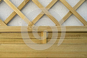 Upper part of a wooden latticework for the garden of an urban terrace. Vector wood photo
