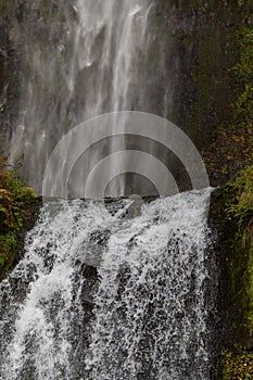 Upper portion of the lower tier of Multnomah waterfall located at Multnomah Creek in the Columbia River Gorge, Oregon