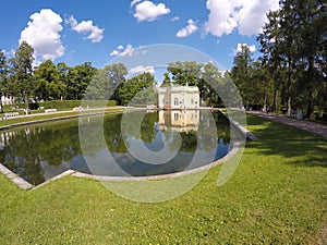 Upper Trough or Mylnya of Their Highnesses pavilion on the bank of the Mirror pond. Catherine Park. Pushkin