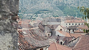 Upper View on Foofs of Old European Marine Town Near Sea Bay And Mountains