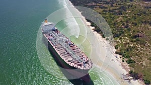 Upper View Modern Tanker Aground on Beach after Hurricane