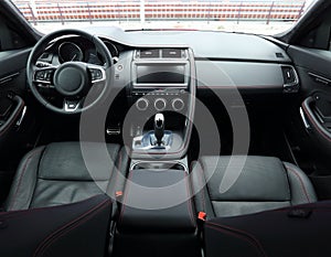 Upper view on the premium car interior with alcantara and leather upholstery