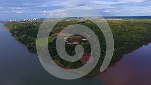 The upper view of river with the Marco Das Tres Fronteiras in the side of Foz do iguaÃ§uin Brazil