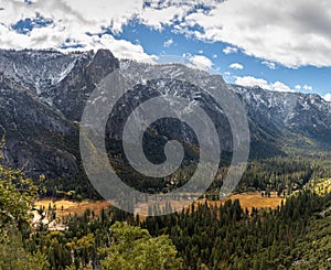 Upper Yosemite Falls wide angle view - Snow covered mountain range over Yosemite Valley