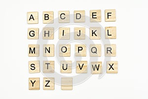 Uppercase alphabet letters on scrabble wooden blocks