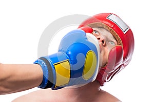 Uppercut punch in the face from the bottom opponent photo