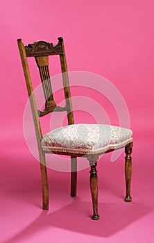 Upright chair with a floral seat