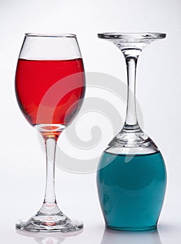 Upright and upside down filled wine glasses