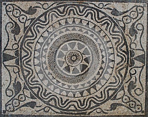 Uprising sun on Mosaic in Roman villa