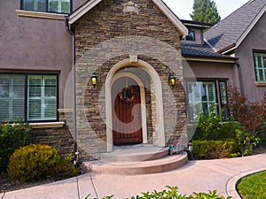 Upscale home with faux stone wall panel photo