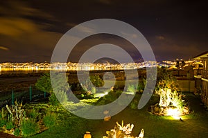 Upscale hotel and Inviting Courtyard and garden at night on Titikaka, Peru in South America