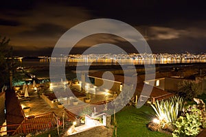 Upscale hotel and Inviting Courtyard and garden at night on Titikaka, Peru in South America photo