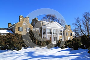 Upscale House with Snow Ground