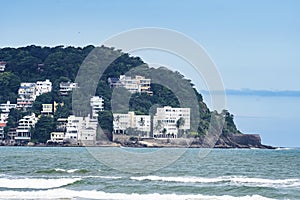 Upscale houses on a hillside by the sea