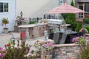 Upscale outdoor patio with kitchen area