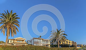 Upscale seaside homes against clear blue sky at Del Mar Southern California