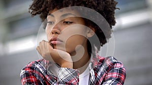 Upset afro-american woman portrait, racial discrimination problem, bullying