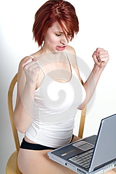 Upset angry woman at computer