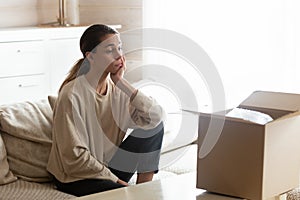 Upset annoyed young woman irritated by bad delivery service