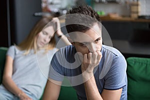 Upset boyfriend thinking of family conflicts after fight with gi