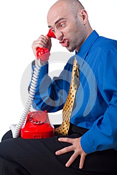 Upset businessman on phone