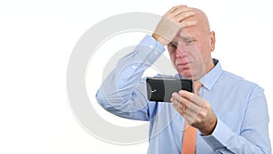 Upset Businessman Reading Bad News on Mobile and Gesturing Nervous