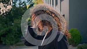 Upset disappointed Caucasian woman girl female unhappy businesswoman walking outside in city worry business trouble