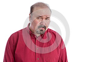 Upset and disappointed frowning middle-aged man