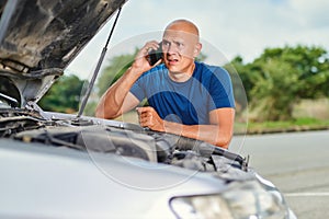 Upset driver man in front car collision accident in road