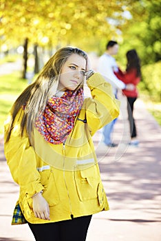 Upset girl and a couple