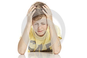 The upset guy holds his hands behind his head.  over white background