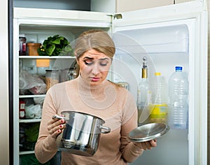 Upset housewife with foul meal