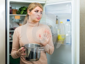 Upset housewife with foul meal