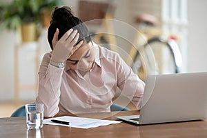Upset Indian female employee stressed by news online