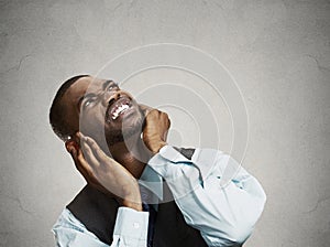 Upset man asking neighbor to stop making loud noise photo