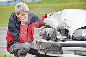 Upset man after car crash