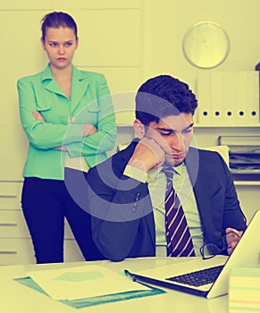 Upset man with disgruntled boss