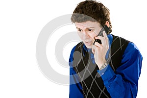 Upset man talking with mobile phone