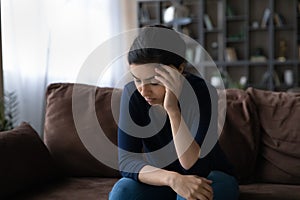 Upset millennial Indian woman think suffer from problems