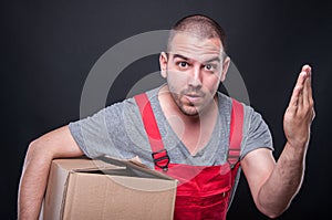 Upset mover guy showing threatening gesture