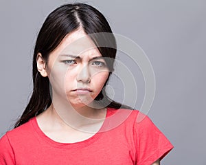 Upset, pouting Chinese woman