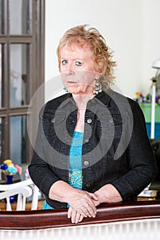 Upset Senior Woman in Denim jacket